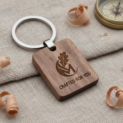 Giá tốt Logo tùy chỉnh Keychain gỗ khắc thủ công tùy chỉnh và nhẫn chìa khóa kim loại được thiết kế cho tiếp thị độc đáo trực tuyến